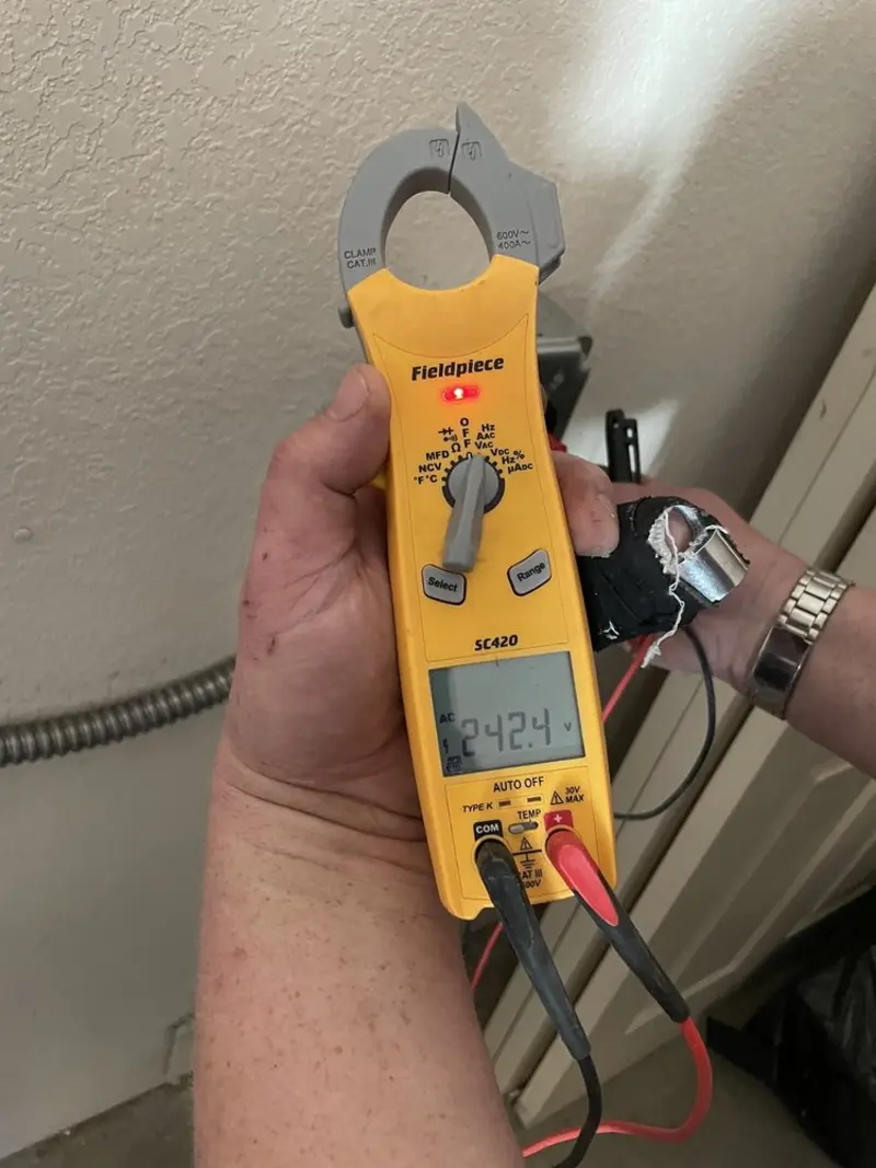 Voltage testing with clamp meter during Generator Installation in Holly Springs